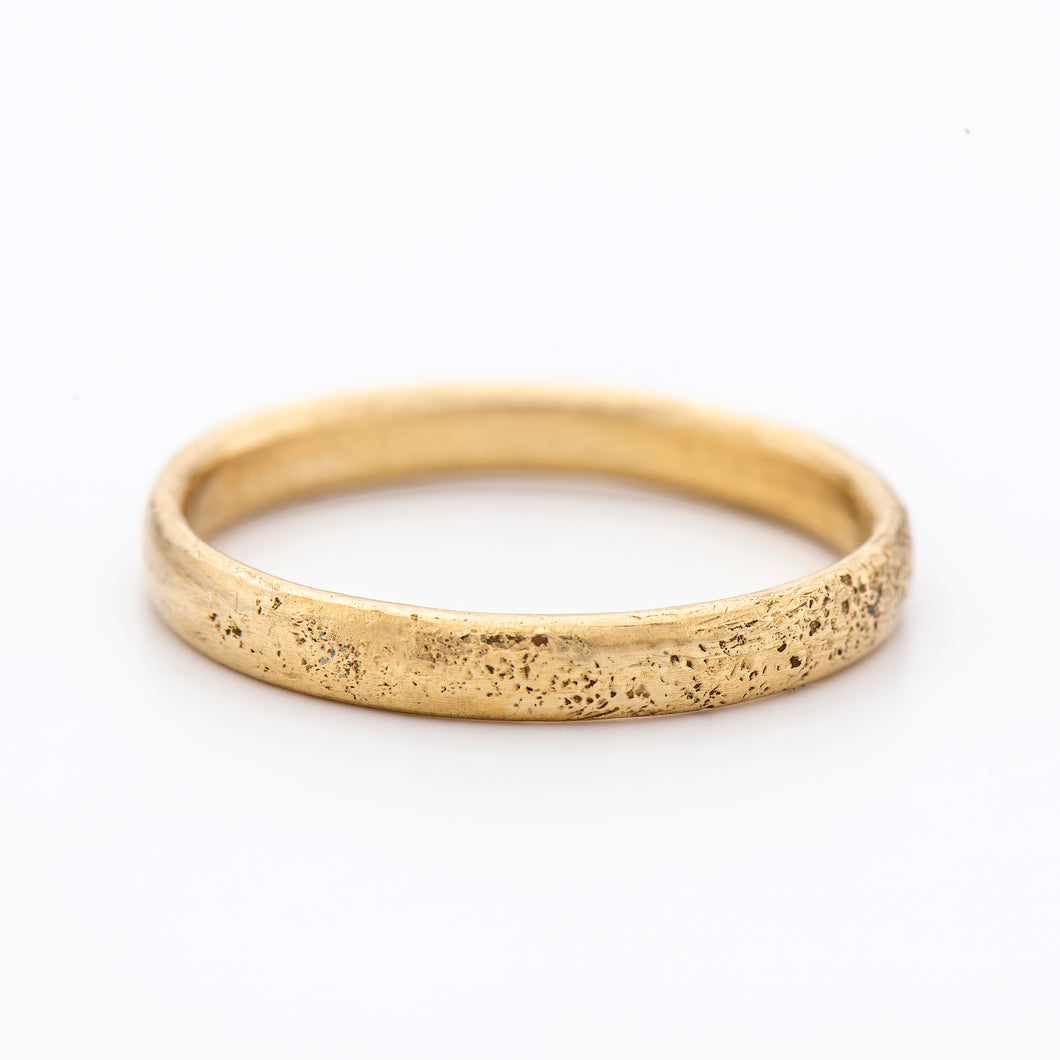 B1004 | Ancient textured Wedding Band- oval profile